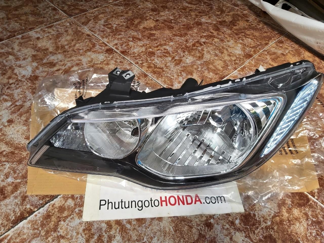 Vỏ Đèn pha sử dụng xe CIVIC 2006-2008 - hàng nhập khẩu chính ngạch