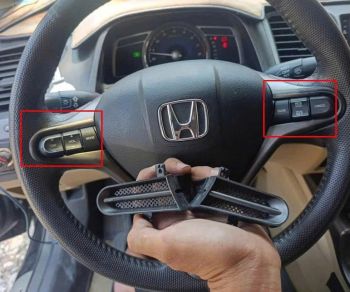 Công tắc cruise control gas tự động và công tắc điều khiển chỉnh âm lượng ở vô lăng Xe Honda Civic 2006-2011 